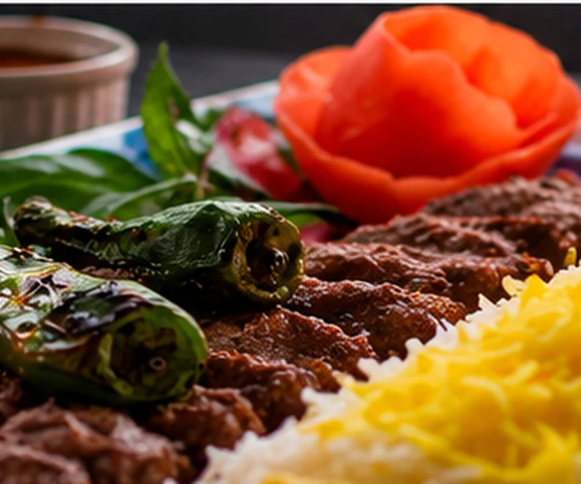 Koobideh kebab plated with rice